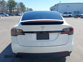 2022 Tesla Model X with VIN 7SAXCDE58NF342776, listed as a IAAI auction lot 42042369 with 70,301 mi miles and . Bid and sale history available at carsss.com. Image 16.