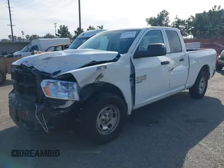 2023 Ram 1500 Tradesman with VIN 1C6RR6FG3PS593993, listed as a IAAI auction lot 41757036 with 28,654 mi miles and . Bid and sale history available at DreamBid. Image 2.
