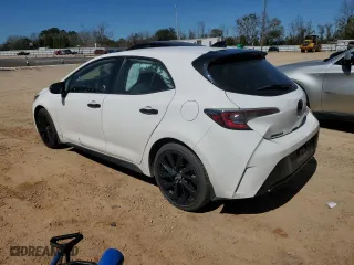 2021 Toyota Corolla Hatchback SE with VIN JTND4MBE4M3132376, listed as a Copart auction lot 47357005 with 104,713 mi miles and Salvage Title. Bid and sale history available at carsss.com. Image 2.