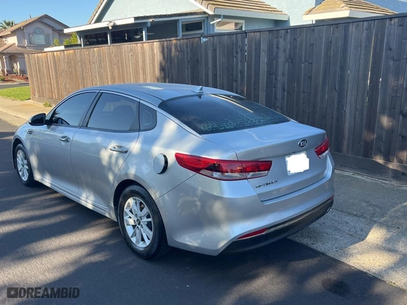 2016 Kia Optima LX with VIN 5XXGT4L38GG022940, listed as a Copart auction lot 54086785 with 145,038 mi miles and Clean Title. Bid and sale history available at carsss.com. Image 3.