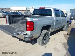 2015 Chevrolet Silverado 1500 LT with VIN 3GCUKREH1FG269823, listed as a IAAI auction lot 41398008 with 210,788 mi miles. Bid and sale history available at carsss.com. Image 4.