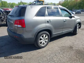 2012 Kia Sorento LX with VIN 5XYKT3A65CG266682, listed as a IAAI auction lot 42220120 with 118,153 mi miles and . Bid and sale history available at carsss.com. Image 4.