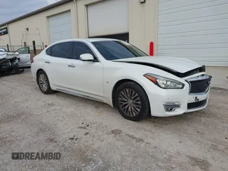 2015 Infiniti Q70 z VIN JN1BY1PP5FM601628, wystawiony jako IAAI lot #41510075 z przebiegiem 102 363 mil mil oraz . Historia ofert i sprzedaży dostępna na DreamBid. Obrazek 1.