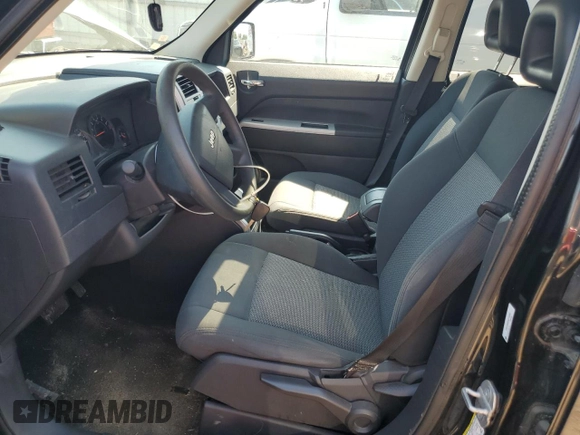 2008 Jeep Patriot Sport with VIN 1J8FF28WX8D744053, listed as a Copart auction lot 63198215 with 173,653 mi miles and Clean title. Bid and sale history available at DreamBid. Image 7.