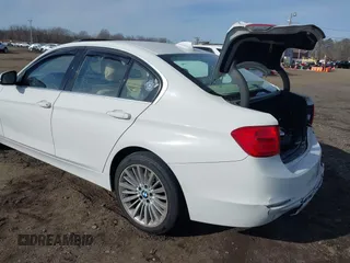 2014 BMW 3 Series 335i xDrive with VIN WBA3B9C52EJ466045, listed as a IAAI auction lot 41281384 with 136,329 mi miles. Bid and sale history available at carsss.com. Image 19.