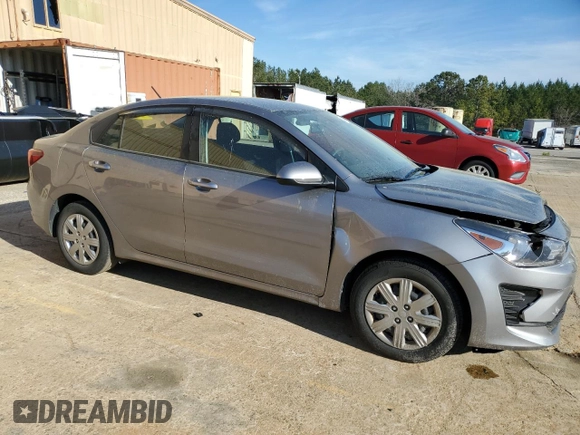 2023 Kia Rio LX with VIN 3KPA24AD6PE572943, listed as a Copart auction lot 48073475 with 34,677 mi miles and Salvage Title. Bid and sale history available at DreamBid. Image 4.