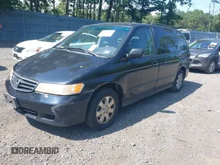 2003 Honda Odyssey EX-L with VIN 5FNRL18003B042487, listed as a IAAI auction lot 42604399 with 188,126 mi miles and . Bid and sale history available at DreamBid. Image 2.