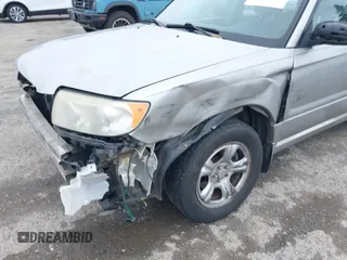 2006 Subaru Forester 2.5 X with VIN JF1SG63676G751013, listed as a IAAI auction lot 41905318 with 214,172 mi miles. Bid and sale history available at carsss.com. Image 6.