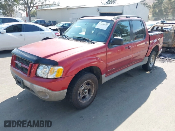 2002 Ford Explorer Sport Trac Value z VIN 1FMZU67EX2UC75933, wystawiony jako IAAI lot #42181837 z przebiegiem 223 979 mil mil oraz . Historia ofert i sprzedaży dostępna na DreamBid. Obrazek 2.