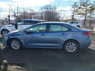 2023 Toyota Corolla Hybrid LE with VIN JTDBCMFE4P3025924, listed as a IAAI auction lot 41463750 with 9,553 mi miles. Bid and sale history available at carsss.com. Image 14.