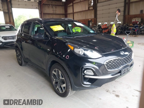 2021 Kia Sportage EX z VIN KNDPNCAC5M7886551, wystawiony jako IAAI lot #42645206 z przebiegiem 49 312 mil mil oraz . Historia ofert i sprzedaży dostępna na DreamBid. Obrazek 1.