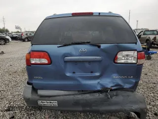 2001 Toyota Sienna LE with VIN 4T3ZF13C41U399056, listed as a Copart auction lot 76388854 with 183,373 mi miles and Salvage Title. Bid and sale history available at carsss.com. Image 6.