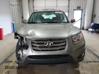 2011 Hyundai Santa Fe Limited z VIN 5XYZKDAGXBG085463, wystawiony jako Copart lot #59964705 z przebiegiem 168 021 mil mil oraz Szkoda całkowita • Salvage title. Historia ofert i sprzedaży dostępna na DreamBid. Obrazek 5.