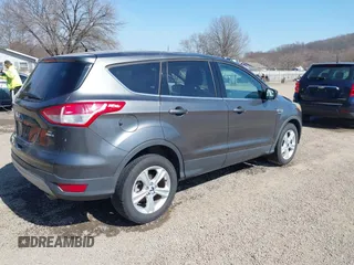 2015 Ford Escape SE with VIN 1FMCU9GX1FUC19376, listed as a IAAI auction lot 41769390 with 98,334 mi miles. Bid and sale history available at carsss.com. Image 4.