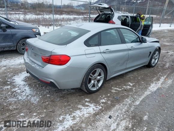 2016 BMW 4 Series 428i xDrive with VIN WBA4C9C53GG136870, listed as a IAAI auction lot 41410071 with 116,187 mi miles and . Bid and sale history available at DreamBid. Image 4.