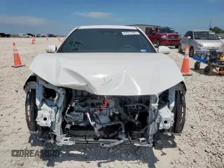 2025 Toyota Camry LE z VIN 4T1DAACK2SU556335, wystawiony jako Copart lot #57317485 z przebiegiem 3 410 mil mil oraz Szkoda całkowita • Salvage title. Historia ofert i sprzedaży dostępna na DreamBid. Obrazek 5.