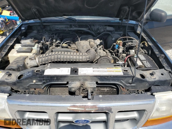 1999 Ford Ranger XLT with VIN 1FTZR15X8XTB13048, listed as a Copart auction lot 53948805 with 154,436 mi miles and Salvage title. Bid and sale history available at DreamBid. Image 11.