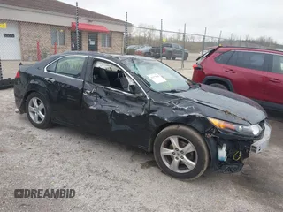 2010 Acura TSX with VIN JH4CU2F62AC006468, listed as a IAAI auction lot 42177842 with 128,219 mi miles and . Bid and sale history available at DreamBid. Image 1.