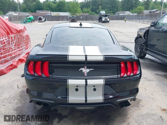 2021 Ford Mustang EcoBoost z VIN 1FA6P8TH4M5117245, wystawiony jako IAAI lot #39793267 z przebiegiem 15 913 mil mil oraz . Historia ofert i sprzedaży dostępna na DreamBid. Obrazek 16.