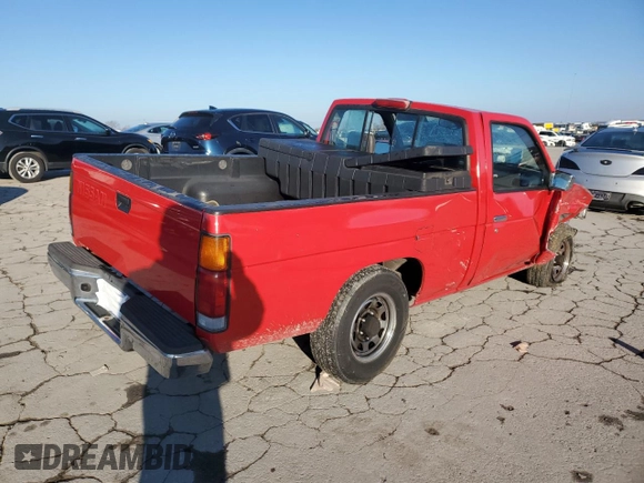 1994 Nissan Frontier with VIN 1N6SD11SXRC360680, listed as a Copart auction lot 84196824 with 105,338 mi miles and Salvage title. Bid and sale history available at DreamBid. Image 3.