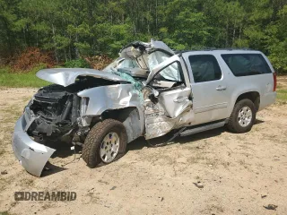 2014 Chevrolet Suburban LT with VIN 1GNSCJE0XER241377, listed as a Copart auction lot 61086715 with Not provided miles and Salvage title. Bid and sale history available at DreamBid. Image 1.