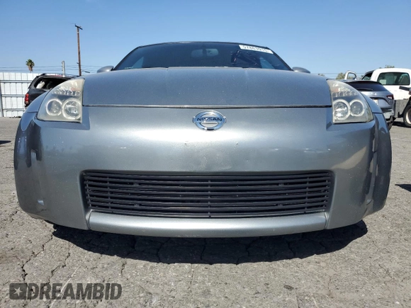 2004 Nissan 350Z Enthusiast z VIN JN1AZ36D34T110490, wystawiony jako Copart lot #57863915 z przebiegiem 139 757 mil mil oraz Szkody całkowita. Historia ofert i sprzedaży dostępna na DreamBid. Obrazek 5.