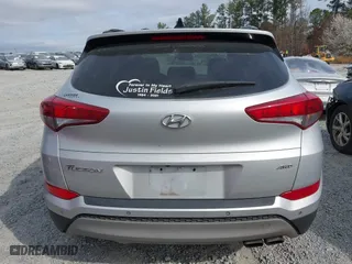 2018 Hyundai Tucson Value with VIN KM8J3CA21JU816783, listed as a IAAI auction lot 41716795 with 84,580 mi miles. Bid and sale history available at carsss.com. Image 16.
