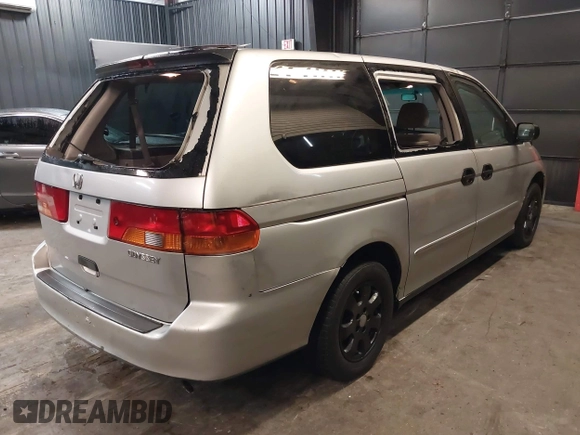 2002 Honda Odyssey LX z VIN 2HKRL18532H573727, wystawiony jako IAAI lot #42266783 z przebiegiem 127 491 mil mil oraz . Historia ofert i sprzedaży dostępna na DreamBid. Obrazek 4.