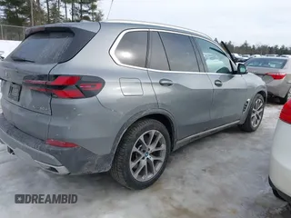 2024 BMW X5 xDrive50e with VIN 5UX43EU05R9S32424, listed as a IAAI auction lot 41622605 with 24,586 mi miles. Bid and sale history available at carsss.com. Image 4.