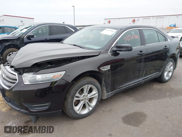 2014 Ford Taurus SEL z VIN 1FAHP2E85EG121636, wystawiony jako IAAI lot #41036886 z przebiegiem 117 460 mil mil oraz . Historia ofert i sprzedaży dostępna na DreamBid. Obrazek 17.