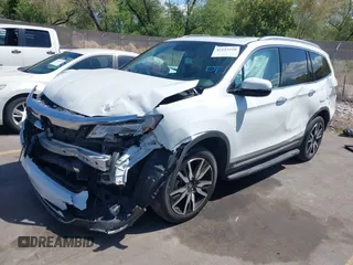 2021 Honda Pilot Touring 8-Passenger z VIN 5FNYF6H94MB087593, wystawiony jako IAAI lot #42153310 z przebiegiem 30 400 mil mil oraz . Historia ofert i sprzedaży dostępna na DreamBid. Obrazek 17.
