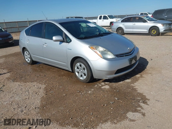 2007 Toyota Prius with VIN JTDKB20UX77658668, listed as a IAAI auction lot 42293558 with 123,007 mi miles and . Bid and sale history available at DreamBid. Image 1.