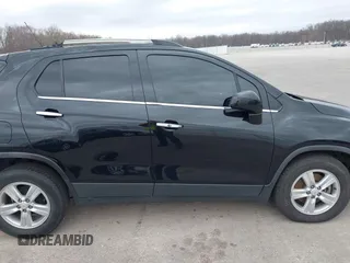 2020 Chevrolet Trax LT with VIN KL7CJLSBXLB003682, listed as a IAAI auction lot 41841753 with 114,624 mi miles and . Bid and sale history available at DreamBid. Image 14.