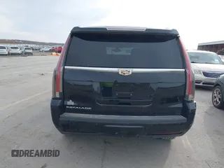 2016 Cadillac Escalade z VIN 1GYS4AKJ5GR411967, wystawiony jako IAAI lot #41848021 z przebiegiem 120 579 mil mil oraz . Historia ofert i sprzedaży dostępna na DreamBid. Obrazek 16.
