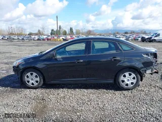 2014 Ford Focus S with VIN 1FADP3E29EL176811, listed as a IAAI auction lot 41808719 with 84,600 mi miles. Bid and sale history available at carsss.com. Image 15.