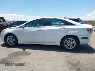 2012 Hyundai Sonata SE z VIN 5NPEC4AC9CH434373, wystawiony jako IAAI lot #42168411 z przebiegiem 120 464 mil mil oraz . Historia ofert i sprzedaży dostępna na DreamBid. Obrazek 15.