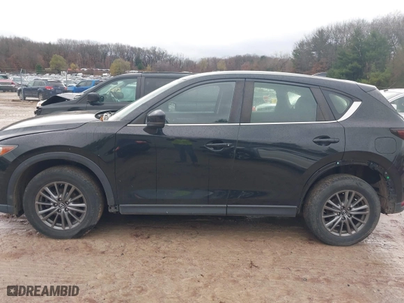 2017 Mazda CX-5 Sport with VIN JM3KFBBL5H0201857, listed as a IAAI auction lot 40885161 with 87,464 mi miles. Bid and sale history available at carsss.com. Image 14.