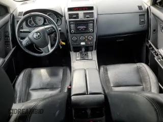 2015 Mazda CX-9 Touring z VIN JM3TB2CA2F0452202, wystawiony jako Copart lot #60407215 z przebiegiem 158 373 mil mil oraz Szkoda całkowita • Salvage title. Historia ofert i sprzedaży dostępna na DreamBid. Obrazek 8.