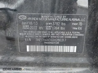 2013 Hyundai Elantra Limited PZEV with VIN 5NPDH4AE6DH280317, listed as a IAAI auction lot 42070870 with 107,063 mi miles. Bid and sale history available at carsss.com. Image 9.