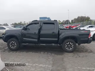 2009 Toyota Tacoma PreRunner with VIN 3TMJU62N99M076105, listed as a IAAI auction lot 42709523 with 206,948 mi miles and . Bid and sale history available at DreamBid. Image 15.