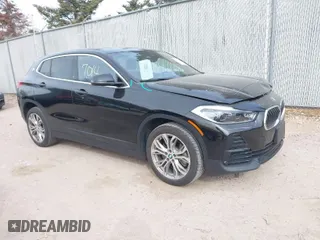 2022 BMW X2 xDrive28i with VIN WBXYJ1C09N5U38465, listed as a IAAI auction lot 41817014 with 46,954 mi miles. Bid and sale history available at carsss.com. Image 1.