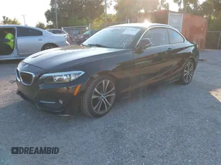 2015 BMW 2 Series 228i with VIN WBA1F5C58FV257021, listed as a IAAI auction lot 41318026 with 154,906 mi miles. Bid and sale history available at carsss.com. Image 17.