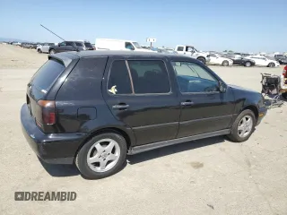 1997 Volkswagen Golf z VIN 3VWLB81H1VM098970, wystawiony jako Copart lot #52580705 z przebiegiem 193 509 mil mil oraz Czysty tytuł • Clean title. Historia ofert i sprzedaży dostępna na DreamBid. Obrazek 3.