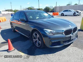 2016 BMW 7 Series 740i with VIN WBA7E2C52GG548048, listed as a IAAI auction lot 41701806 with 72,680 mi miles. Bid and sale history available at carsss.com. Image 1.