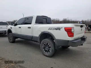 2016 Nissan Titan XD PRO-4X with VIN 1N6BA1F41GN515119, listed as a Copart auction lot 85419494 with 180,435 mi miles and Clean Title. Bid and sale history available at carsss.com. Image 2.