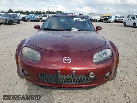 2007 Mazda MX-5 Miata Sport z VIN JM1NC25F270127574, wystawiony jako Copart lot #51538215 z przebiegiem 131 339 mil mil oraz Szkoda całkowita • Salvage title. Historia ofert i sprzedaży dostępna na DreamBid. Obrazek 5.