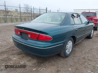 1998 Buick Century Limited with VIN 2G4WY52MXW1573044, listed as a IAAI auction lot 41967391 with 142,169 mi miles. Bid and sale history available at carsss.com. Image 4.
