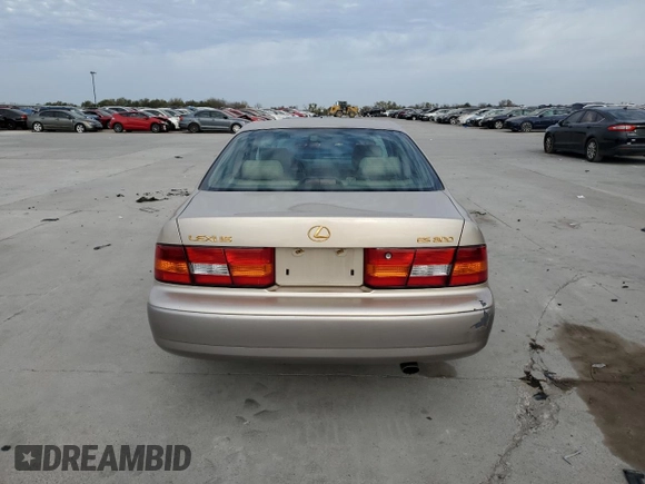 1997 Lexus ES 300 Luxury Sport Sdn with VIN JT8BF22GXV0046390, listed as a Copart auction lot 82545064 with 113,442 mi miles and Salvage Title. Bid and sale history available at carsss.com. Image 6.
