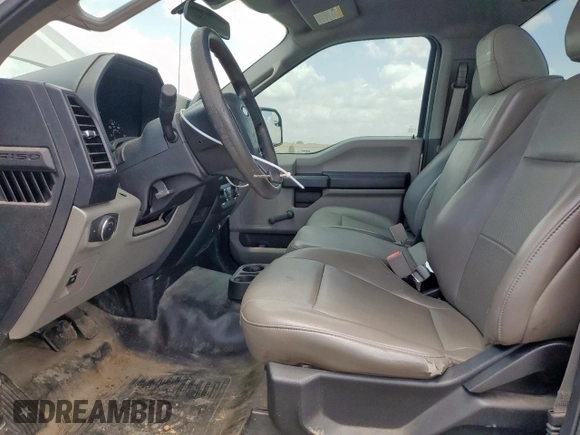 2019 Ford F-150 XL with VIN 1FTMF1CB8KKC24255, listed as a Copart auction lot 64755525 with 100,980 mi miles and Salvage title. Bid and sale history available at DreamBid. Image 7.