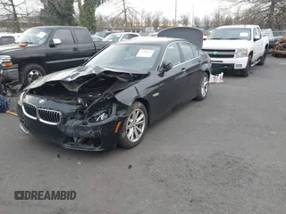 2014 BMW 5 Series 528i with VIN WBA5A5C5XED502261, listed as a IAAI auction lot 41418334 with 139,983 mi miles. Bid and sale history available at carsss.com. Image 2.